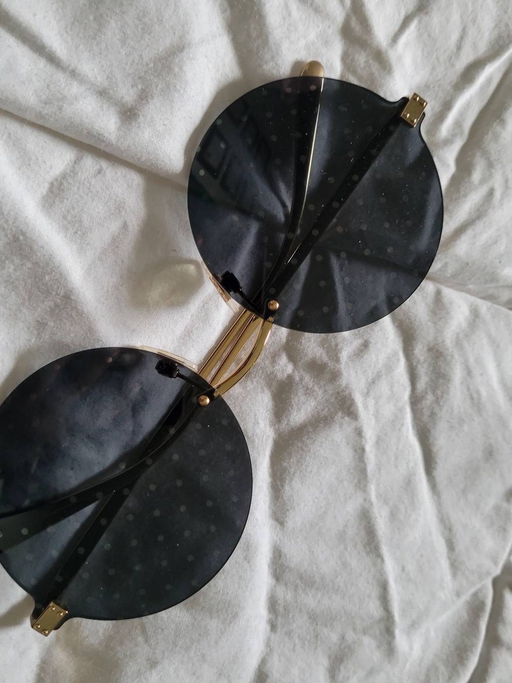 Dolce & Gabbana Round Black Lens Sunglasses with Gold Bridge